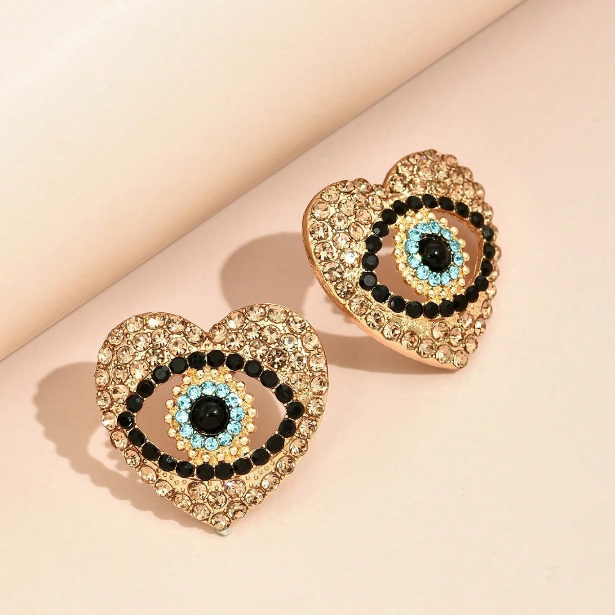 Fashion Heart Inlaid New Personality Hlow Angel Eye Earrings Creative Ear Jewelry