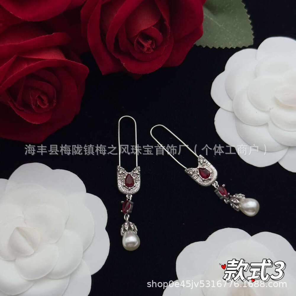 Upmarket Maijia High Version Ghost Skull Head Brass Material Spirit Snake Eagle Claw Exaggerated Long Earrings Sier Needle