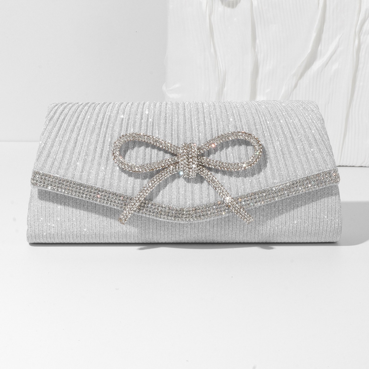 Free Shipping 2025 New Designer Bag Trendy High-quality Shopping Bags Fashion New Evening Bag With Rhinestones Bowknot Glitter Clutch Chain Crossbody