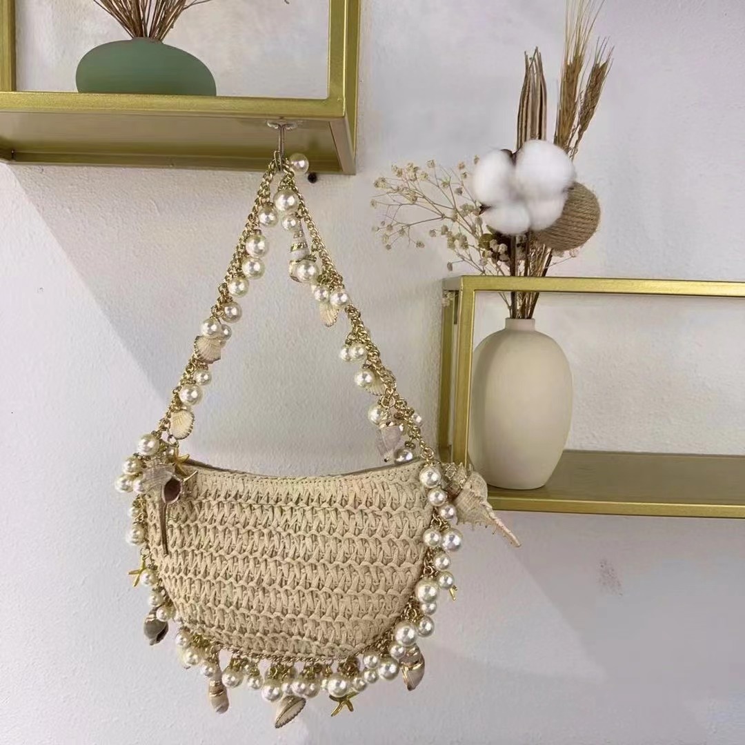 Free shipping designer bag 2023 Spring Summer New Fairy Pearl Conch Straw Bag Handbag Crossbody Bag Small Phone Bag Y2K Trendy
