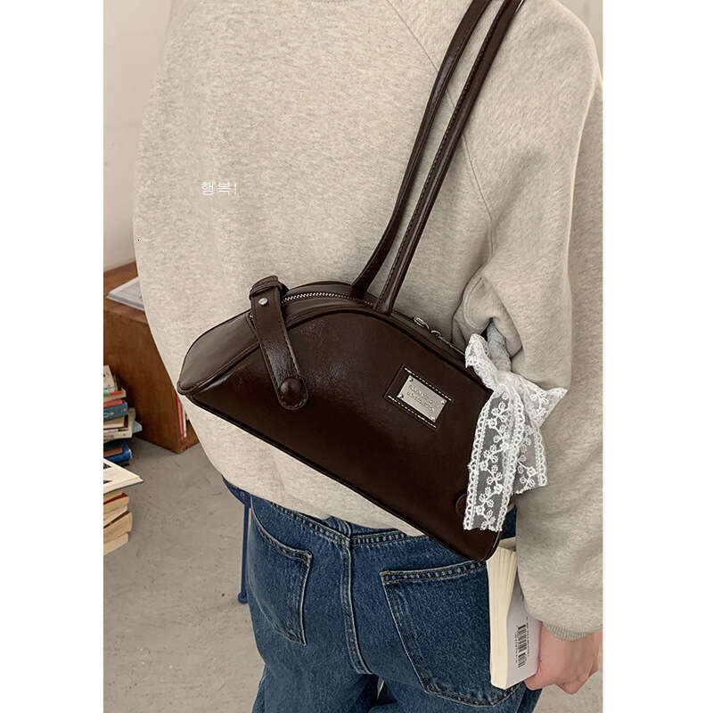 designer bag Niche Texture Underarm for Women 2024 New Fashion Handheld Bowling Versatile Commuter Shoulder Shell Bag