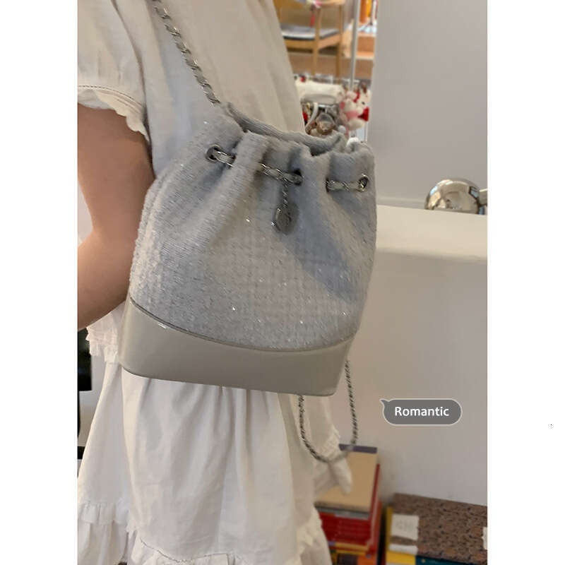 designer bag Women's Small Backpack 2025 New Summer Fashion Niche Bucket Versatile Commuter Chain Shoulder Bag