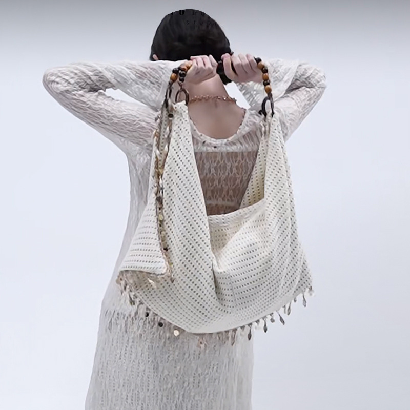 Free shipping designer bag Beach Bag Same Style Cotton 2025 New Summer Woven Hollow Handbag Women Niche Design Mesh Bag Women
