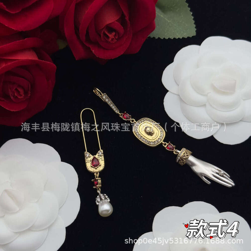 Upmarket Maijia High Version Ghost Skull Head Brass Material Spirit Snake Eagle Claw Exaggerated Long Earrings Sier Needle