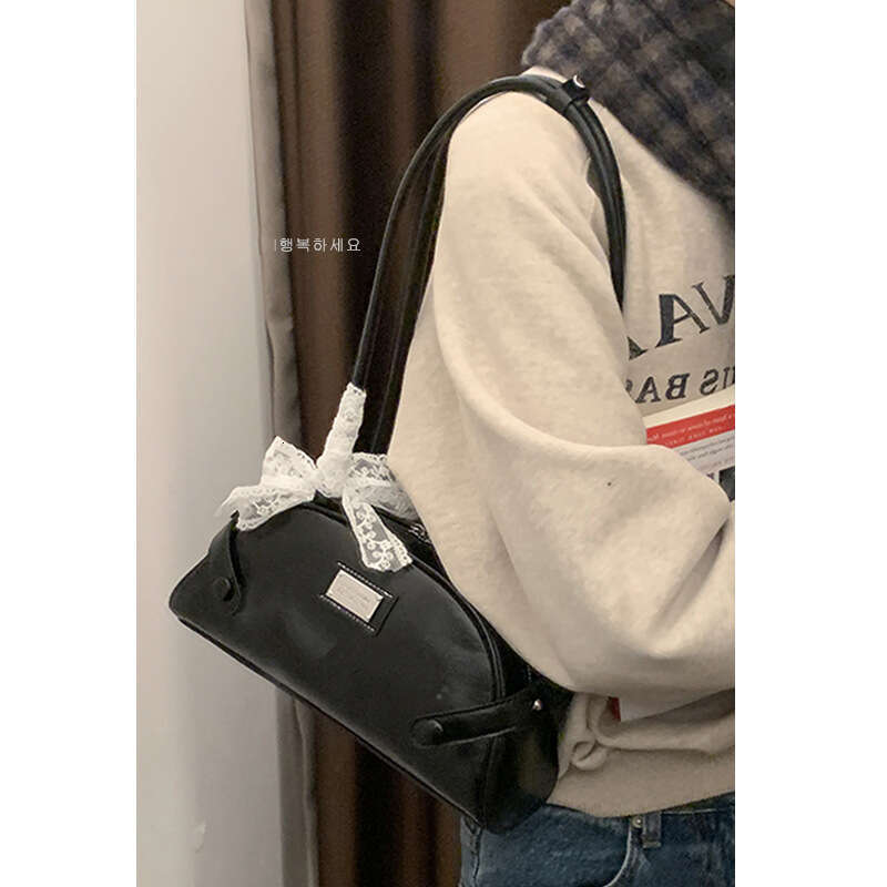 designer bag Niche Texture Underarm for Women 2024 New Fashion Handheld Bowling Versatile Commuter Shoulder Shell Bag