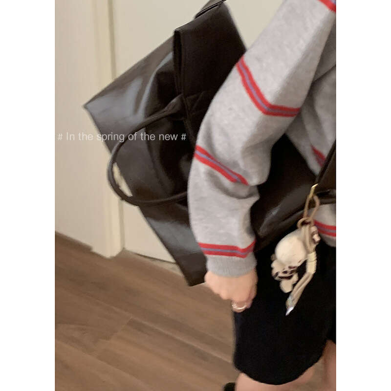 designer bag Autumn Large Capacity Wide Strap Crossbody for Women 2024 New Niche Tote Single Shoulder Commuter Bag