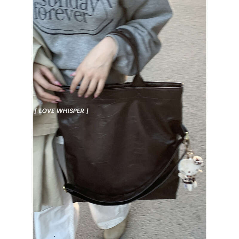 designer bag Autumn Large Capacity Wide Strap Crossbody for Women 2024 New Niche Tote Single Shoulder Commuter Bag