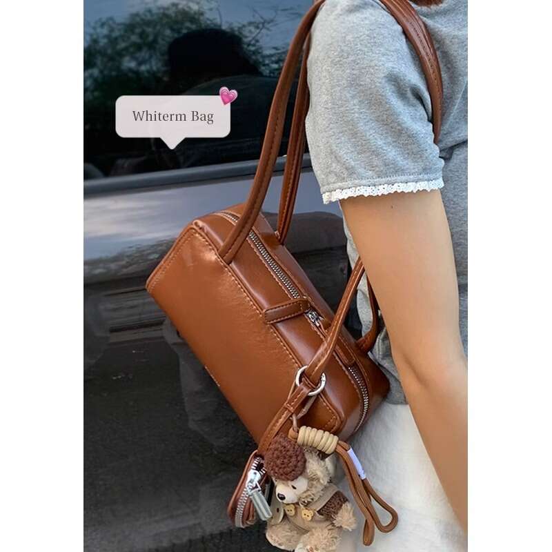 Niche designer bag Underarm for Women 2024 New Simple Handheld Bowling Versatile Shoulder Commuter Bag