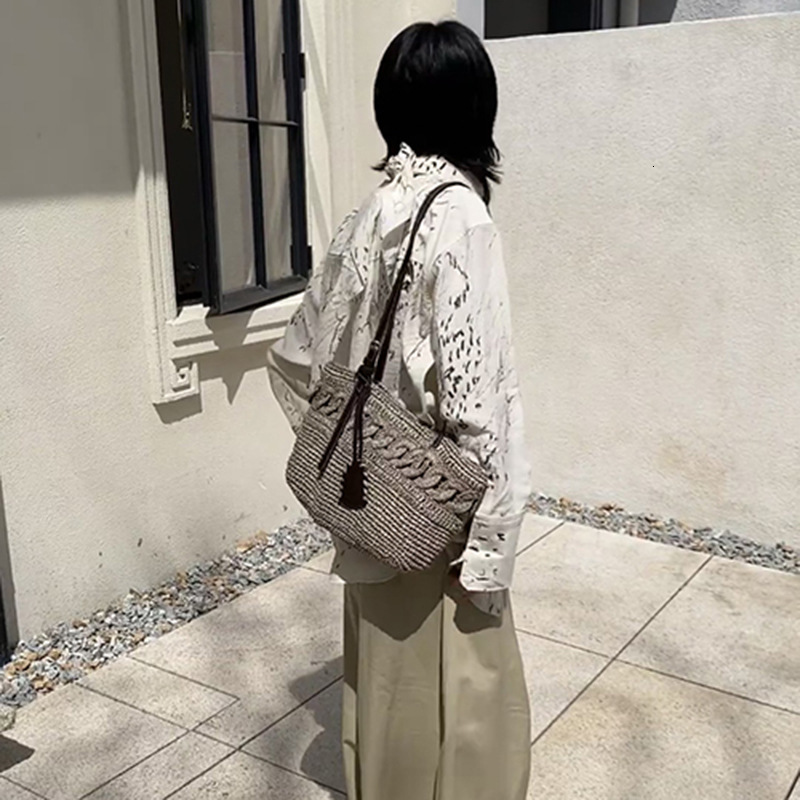Free shipping designer bag Trendy New Women Bag 2025 Summer Straw Bag Fashion Versatile Beach Woven Bag Shoulder Bag Crossbody Handbag Trendy