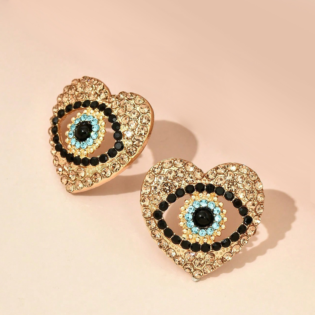 Fashion Heart Inlaid New Personality Hlow Angel Eye Earrings Creative Ear Jewelry