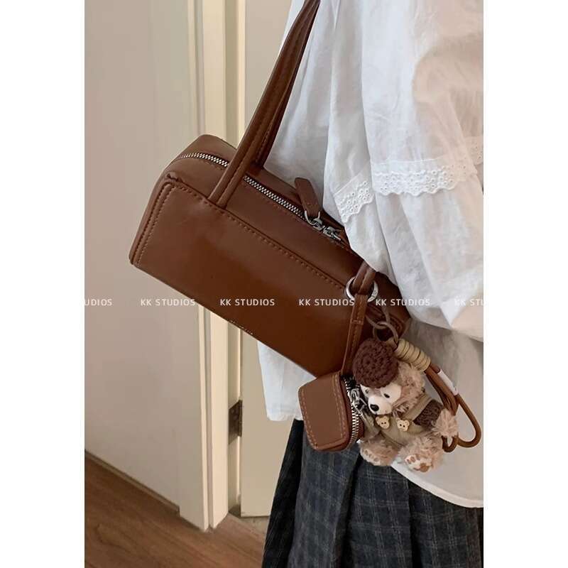 Niche designer bag Underarm for Women 2024 New Simple Handheld Bowling Versatile Shoulder Commuter Bag