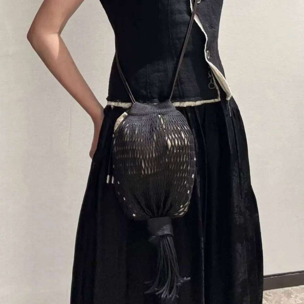 Designer bags 2025 New Tassel Lantern Octopus Net Brand Niche Design Single Shoulder Messenger Fishnet Hollow Woven Bag