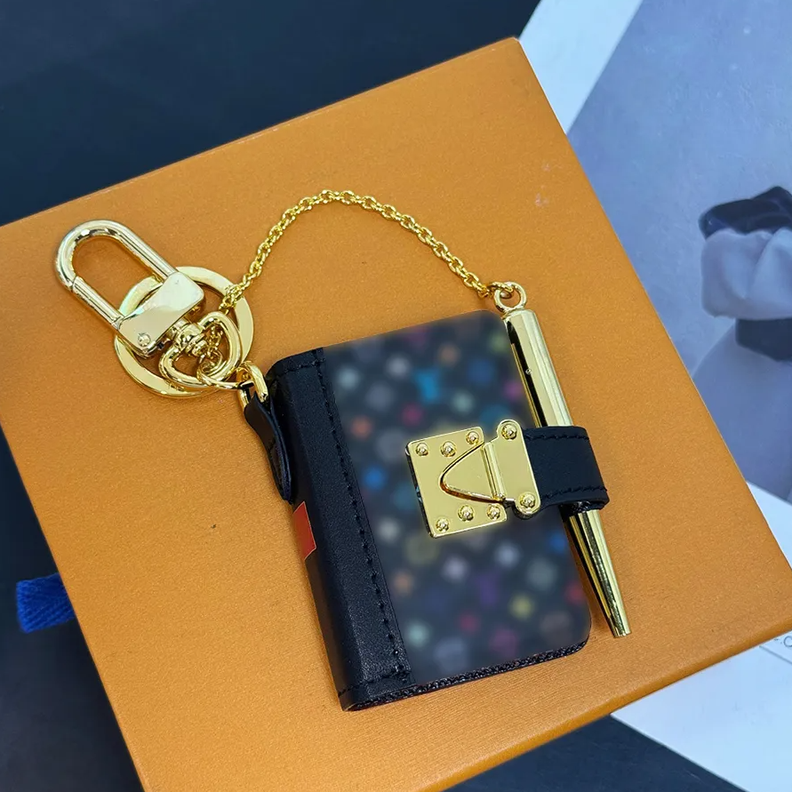 Charm Luxury Charm Luxury Mini Meeting Notebook Chain Keychains Car Keychain keychain purse Purse Fashion Alphabet Handmade Leather Notepad Keychain Men's And W