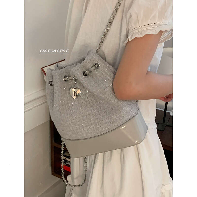 designer bag Women's Small Backpack 2025 New Summer Fashion Niche Bucket Versatile Commuter Chain Shoulder Bag
