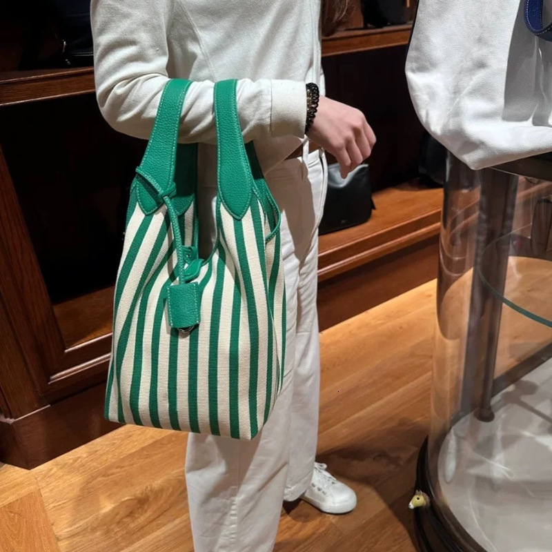 Free shipping designer bag 2025 New Vertical Striped Fashion Large Capacity Canvas Bag Ins Style Simple Letter Commuter Tote Bag Shoulder Bag