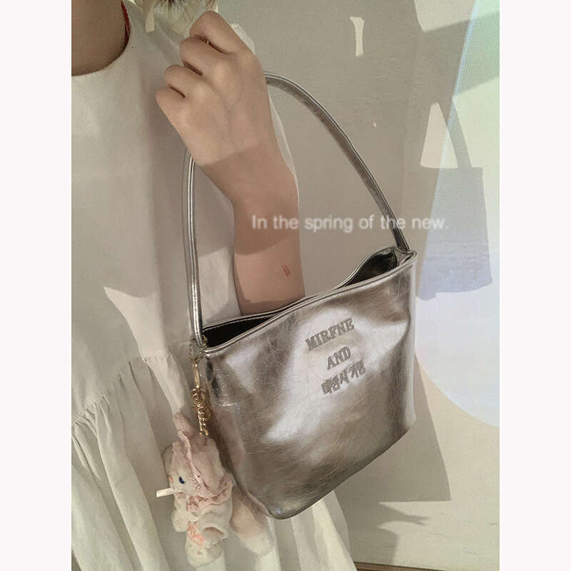 designer bag Fashion Silver Women's Underarm 2024 New Simple Bucket Niche Texture Shoulder Bag