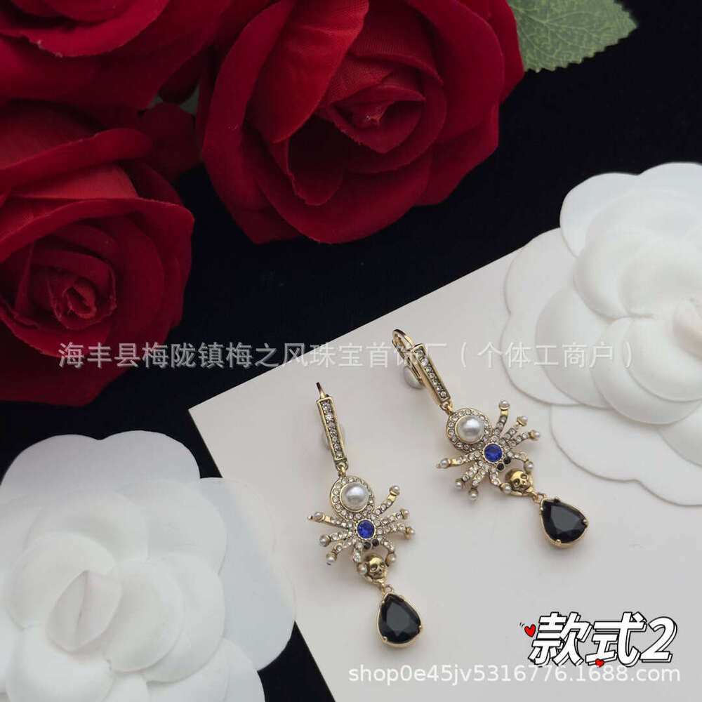 Upmarket Maijia High Version Ghost Skull Head Brass Material Spirit Snake Eagle Claw Exaggerated Long Earrings Sier Needle
