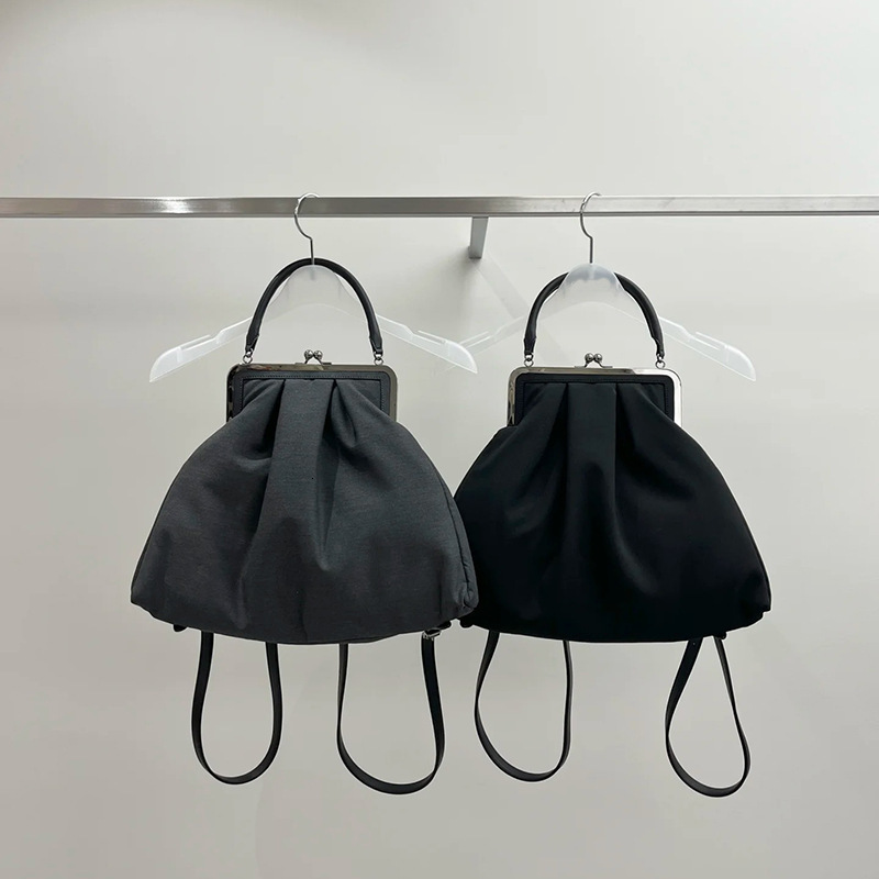 Free shipping designer bag Niche Designer Style Internet Celebrity Casual Versatile Canvas Clip Bag Shoulder Bag Crossbody Bag Backpack New Trend