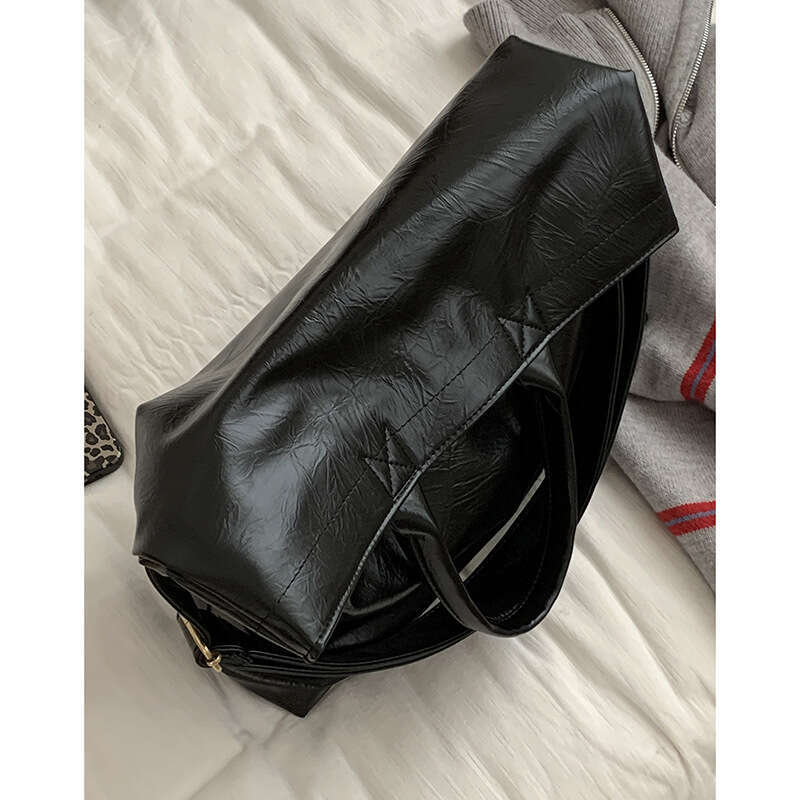 designer bag Autumn Large Capacity Wide Strap Crossbody for Women 2024 New Niche Tote Single Shoulder Commuter Bag
