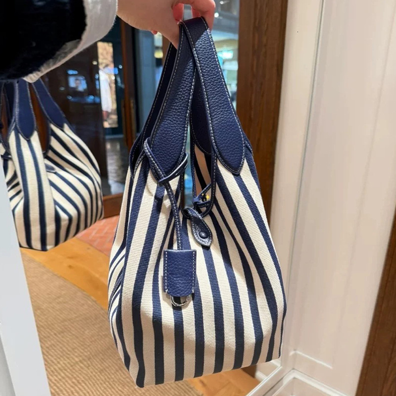 Free shipping designer bag 2025 New Vertical Striped Fashion Large Capacity Canvas Bag Ins Style Simple Letter Commuter Tote Bag Shoulder Bag