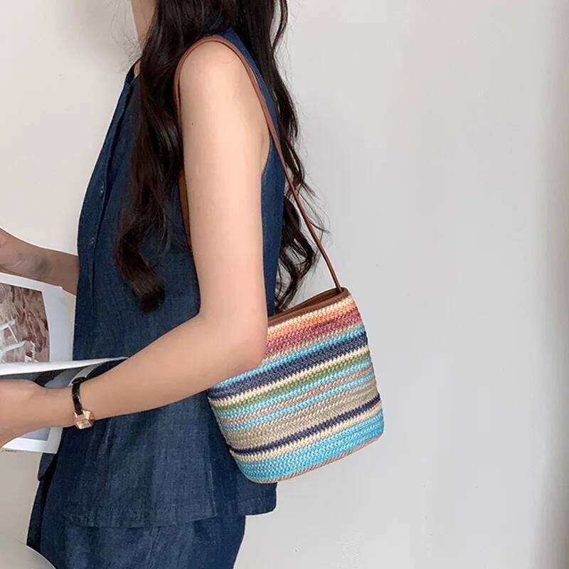 Rainbow colored crossbody for women, 2025 new vacation style grass woven bucket bag, versatile and niche shoulder bag