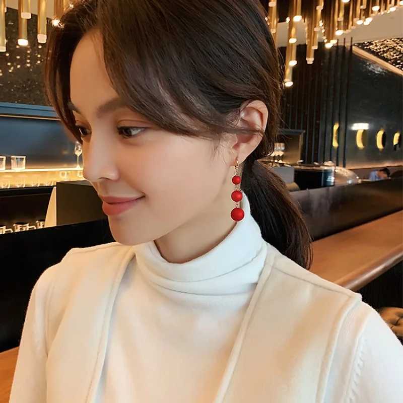 2024 South Korea Red Pearl Festive Temperament Long Tassel Earrings Imitation Pearl Pendant Exaggerated Earrings Womens Jewelry XJ250623