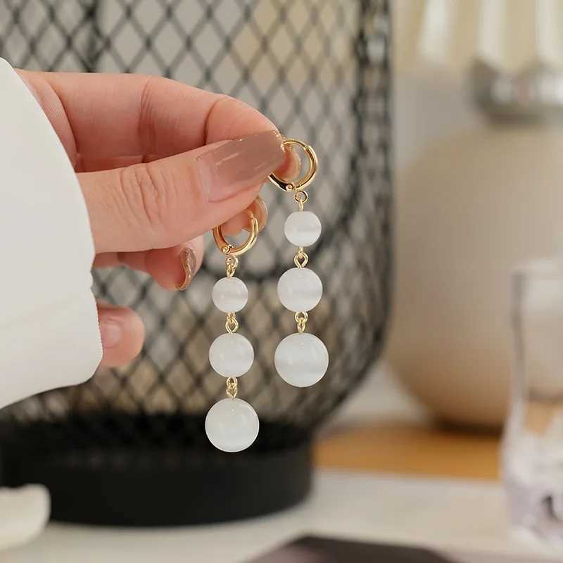 2024 South Korea Red Pearl Festive Temperament Long Tassel Earrings Imitation Pearl Pendant Exaggerated Earrings Womens Jewelry XJ250623