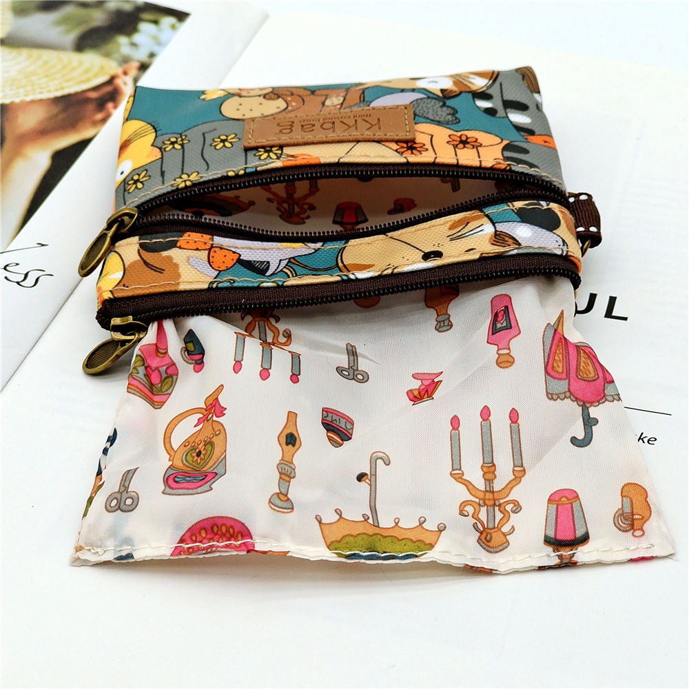 Free Shipping 2025 New Designer Bag Printed Laminated Cartoon Coin Purse Anti-stain Waterproof Lipstick Coin Storage Bag Women's Bag-in-bag