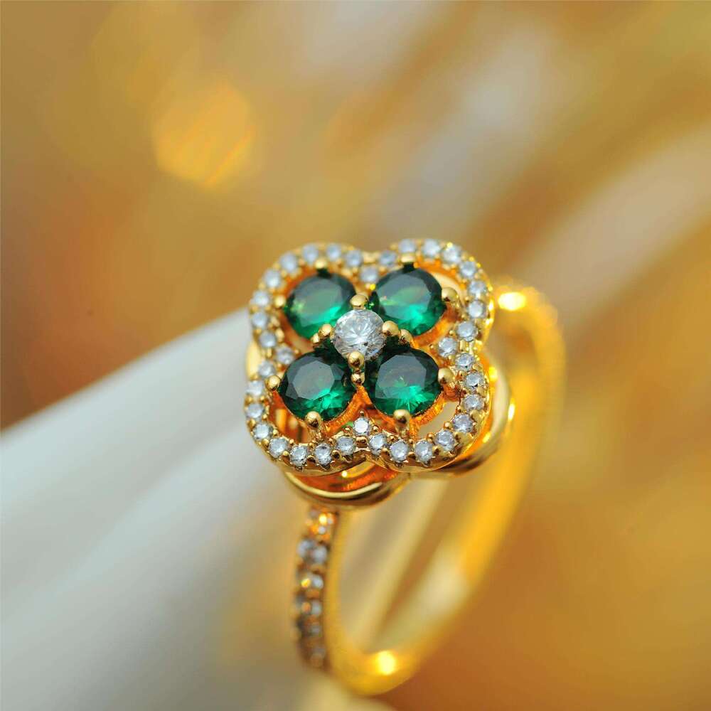 Korean Japanese Style Small and Exquisite Micro-inlaid Green Rotating Zircon Four-leaf Flower Internet Celebrity Personality Versatile Super Shiny Fas