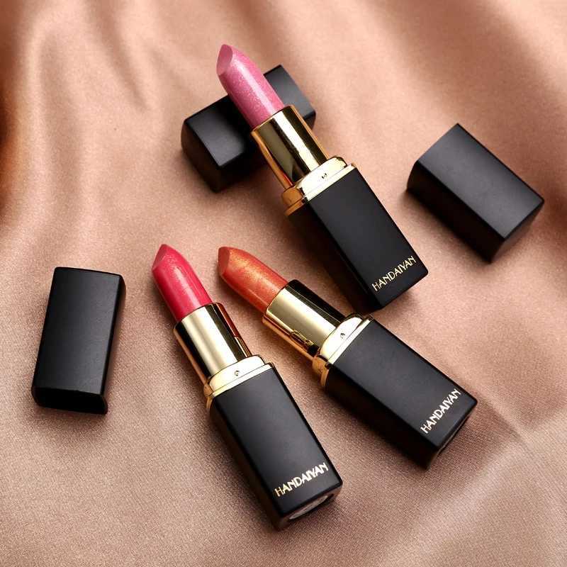Black tube gold shiny lipstick pearl moisturizing lipstick available in 9 colors. XJ250623
