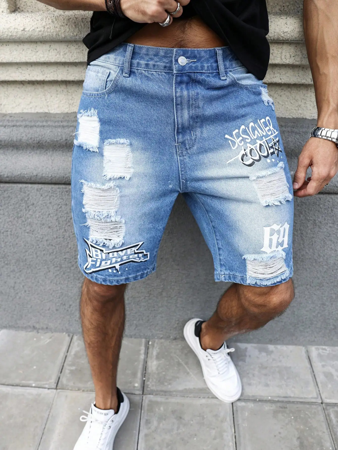 Mens summer blue ripped printed denim shorts. Trendy ripped . Stylish text prints. 250617