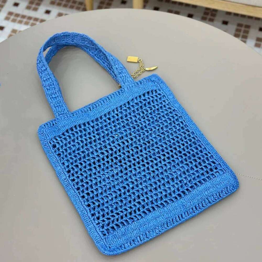 25 Spring/Summer New Grass Woven Bag Large Capacity Totes Hand Knitted Designer Elegant Women's Shoulder Handbag Beach Vacation