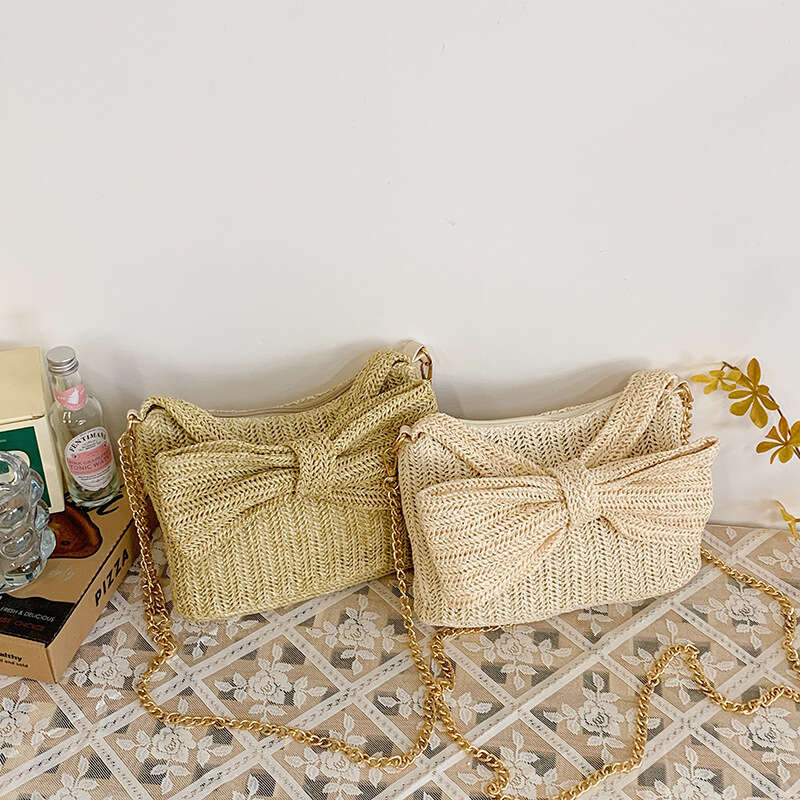 Korean Style Niche Simple for Women 2025 Summer New Fashion Woven Hollow Bow Commuter Crossbody Bag Trend