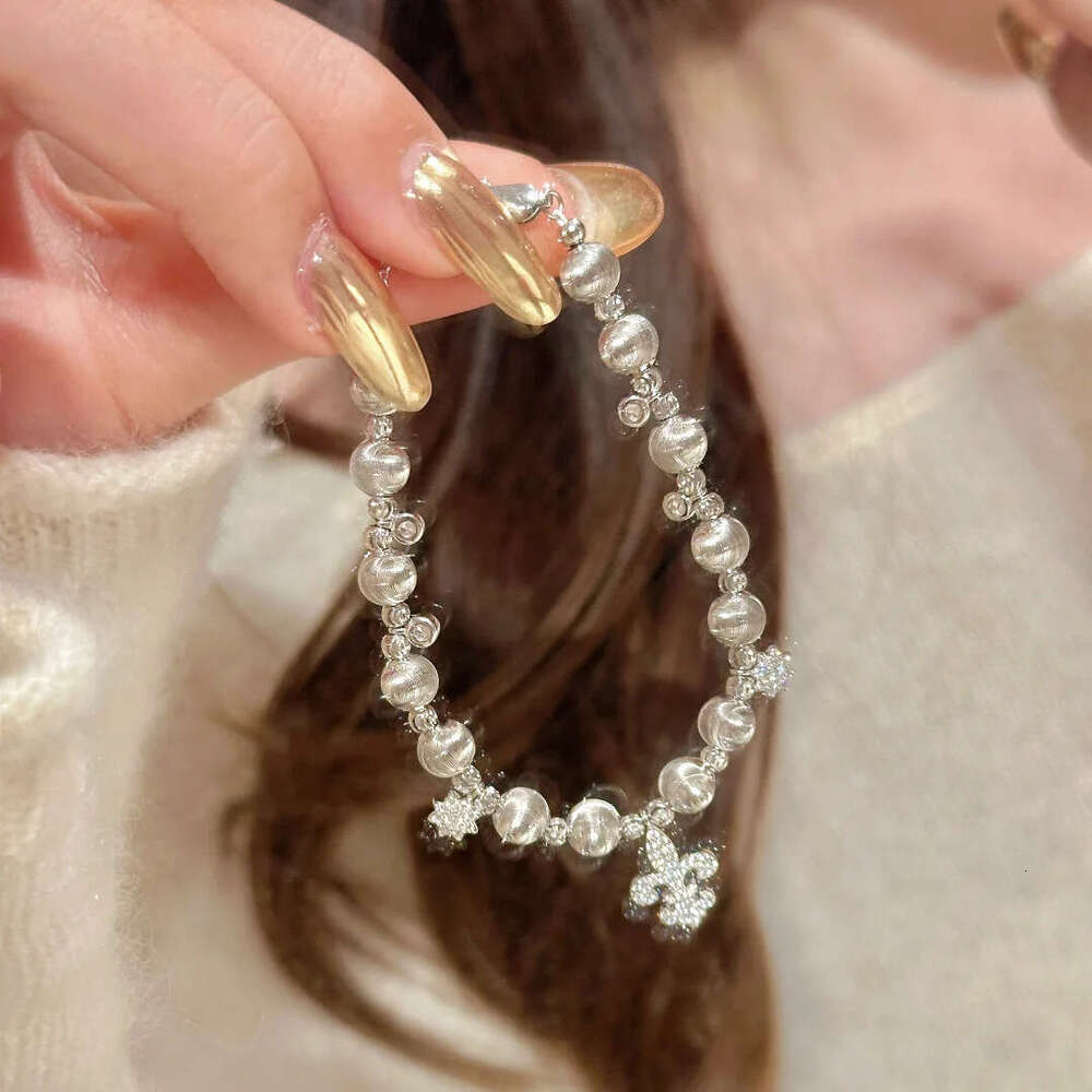 Light Fashion Winter Snowflake Cat Eye New Chinese Style High-end Exquisite Inlaid Dia Iris Flower Bracelet for Women
