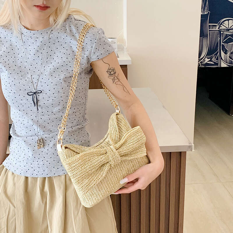 Korean Style Niche Simple for Women 2025 Summer New Fashion Woven Hollow Bow Commuter Crossbody Bag Trend