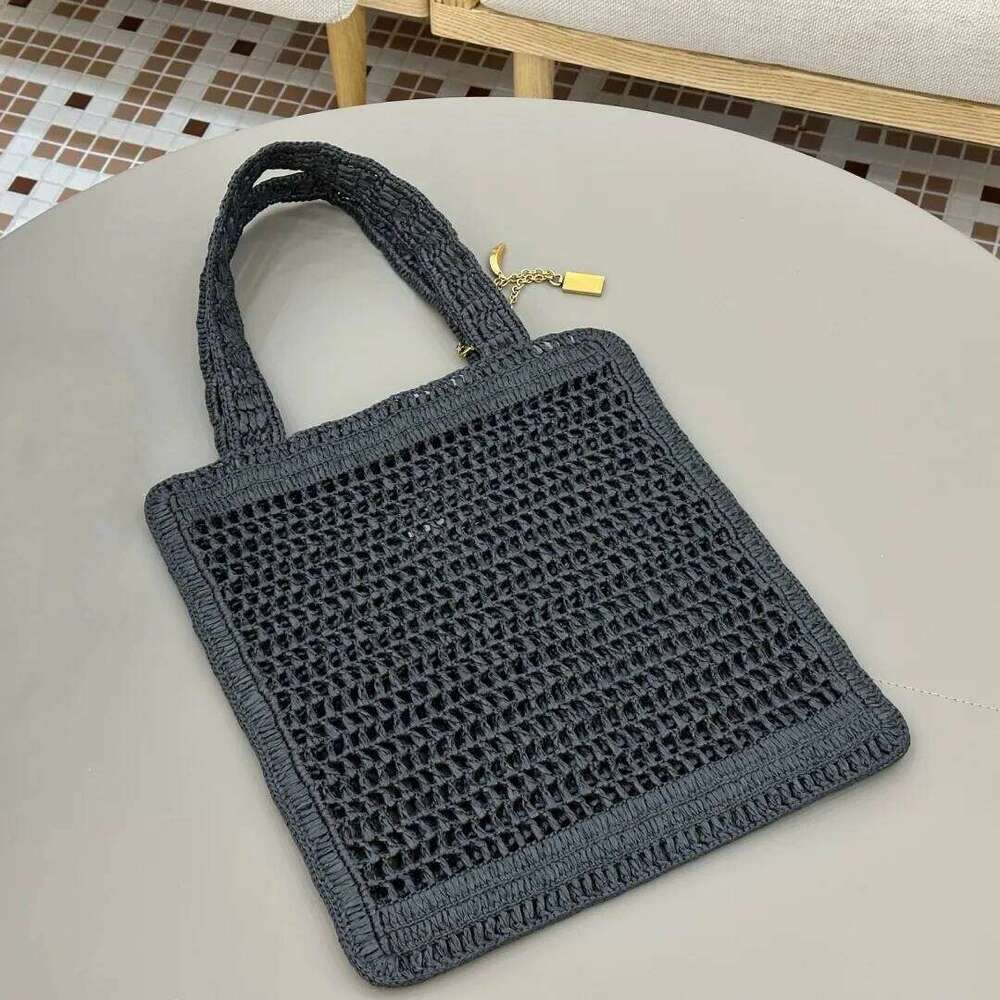 25 Spring/Summer New Grass Woven Bag Large Capacity Totes Hand Knitted Designer Elegant Women's Shoulder Handbag Beach Vacation