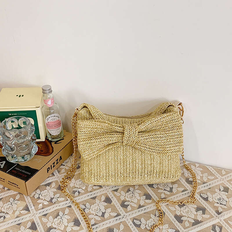 Korean Style Niche Simple for Women 2025 Summer New Fashion Woven Hollow Bow Commuter Crossbody Bag Trend