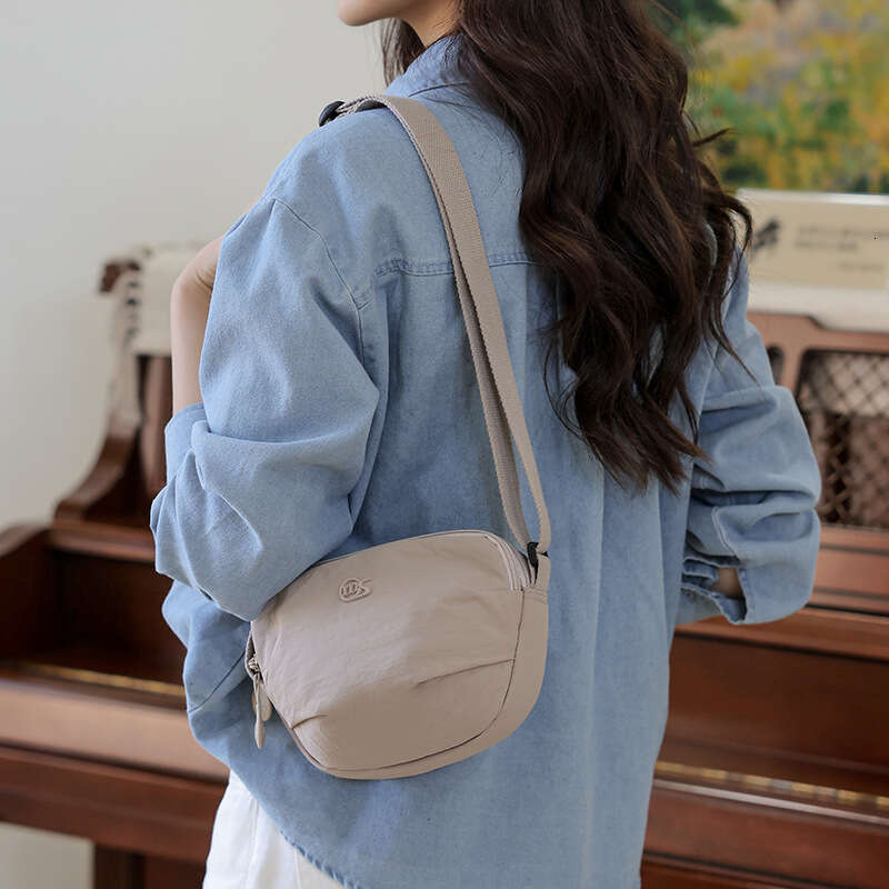 2025 New Fashion Versatile Commuter Shoulder Simple Multi-Compartment Backpack High-Value Casual Solid Color Crossbody Bag