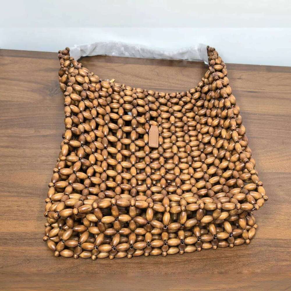 Wooden Bead Handmade Woven 2025 New Retro Design Bags Women's Hollow Out Seaside Travel Hand-held Shoulder Underarm Bag