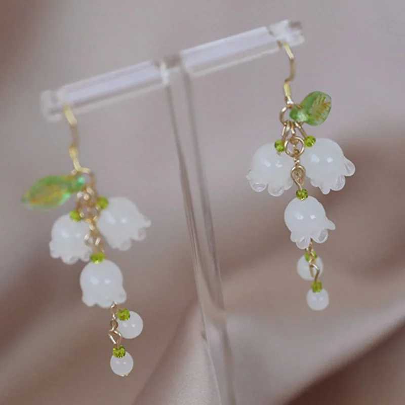 2025 New Sweet Temperament Small Fresh Bamboo White Lily Of The Valley Flower Earrings Elegant And Gentle Asymmetric Earrings XJ250623