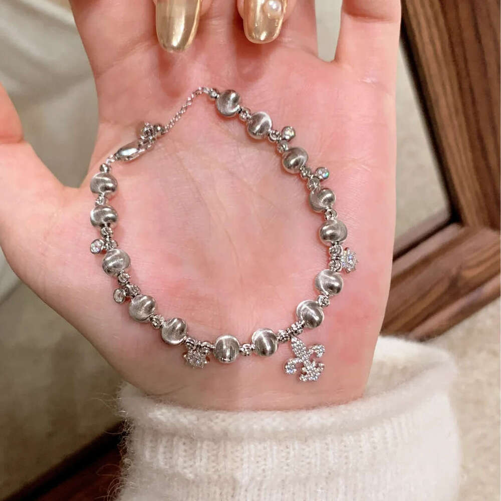 Light Fashion Winter Snowflake Cat Eye New Chinese Style High-end Exquisite Inlaid Dia Iris Flower Bracelet for Women