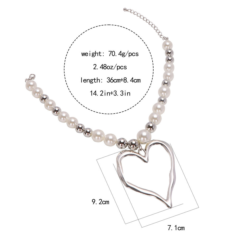 Chic Earrings Set: Bold Lava Heart Pendants Complementing Delicate Pearls