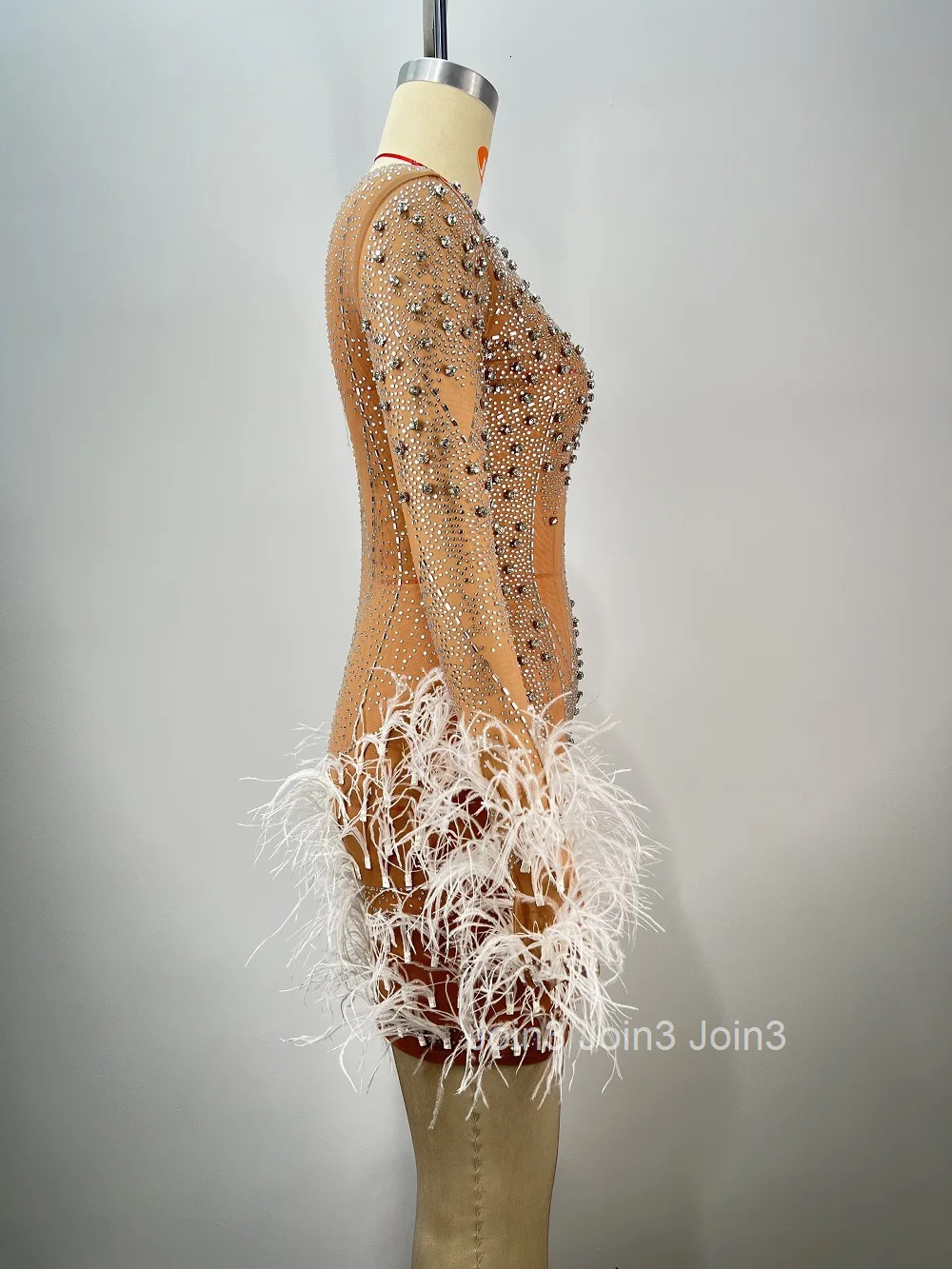 Hot Selling Sexy Perspective Long Sleeved Short Skirt Fashion Nail Diamond Feather Round Neck Dress Stage Performance Costume