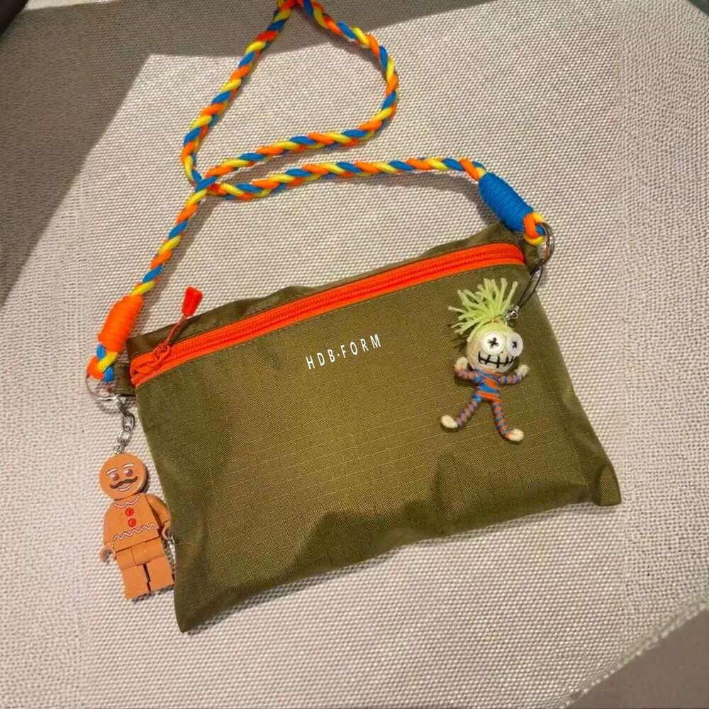 Japanese Trend Brand Mont Fashion New Men and Women Sports Outdoor Waterproof Single Shoulder Crossbody Simple Style Bag