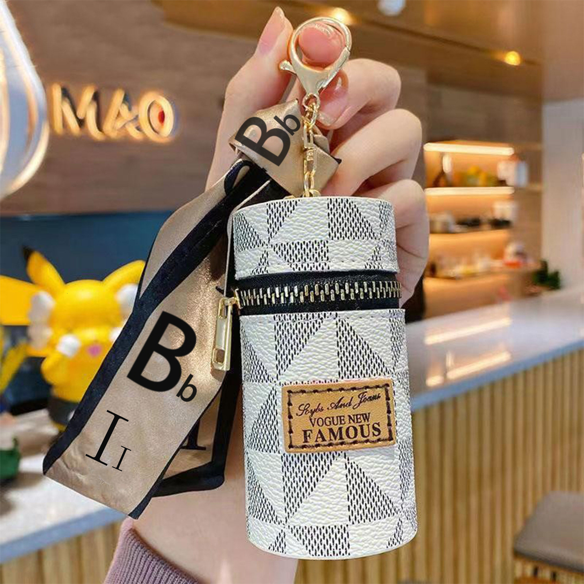 Free Shipping 2025 New Designer Bag Live Streaming Gift Lipstick Bag Key Chain Old Flower Coin Purse Welfare Mini Bucket Bag Hot Sale Light Luxury Fee
