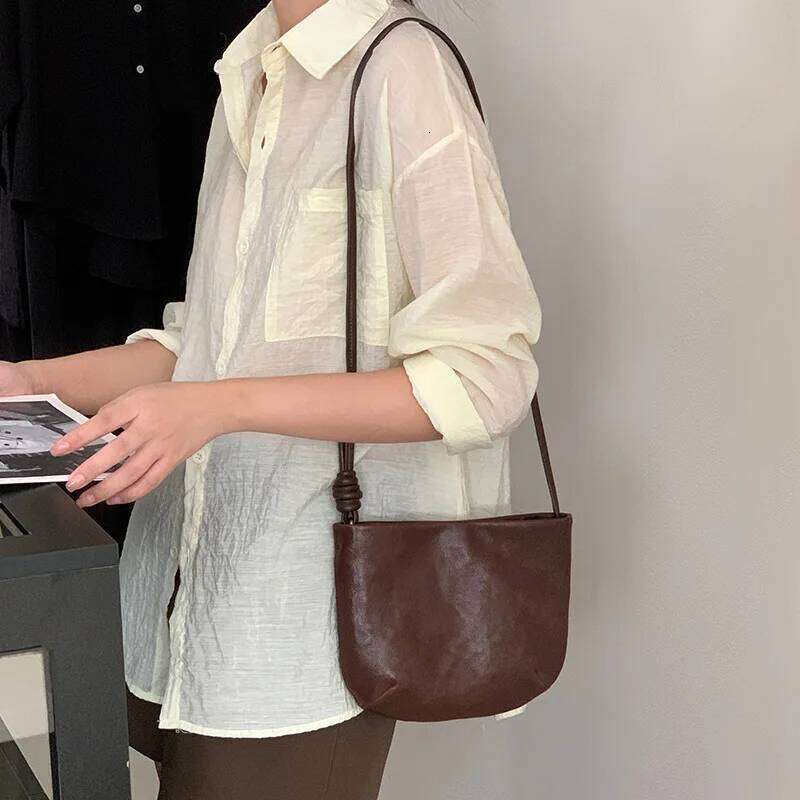 Minimalist leather small for women, 2025 new retro style cowhide saddle bag, niche single shoulder crossbody women's bag
