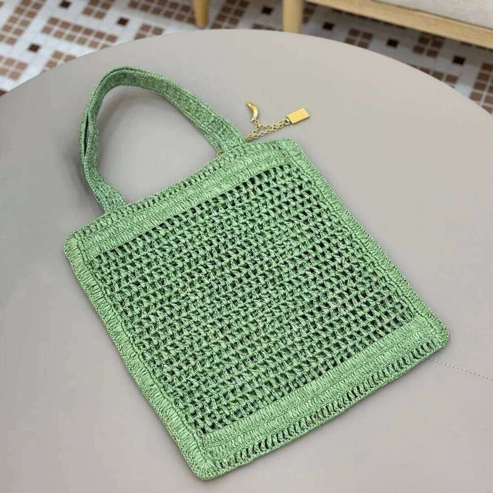 25 Spring/Summer New Grass Woven Bag Large Capacity Totes Hand Knitted Designer Elegant Women's Shoulder Handbag Beach Vacation
