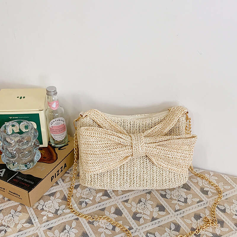 Korean Style Niche Simple for Women 2025 Summer New Fashion Woven Hollow Bow Commuter Crossbody Bag Trend