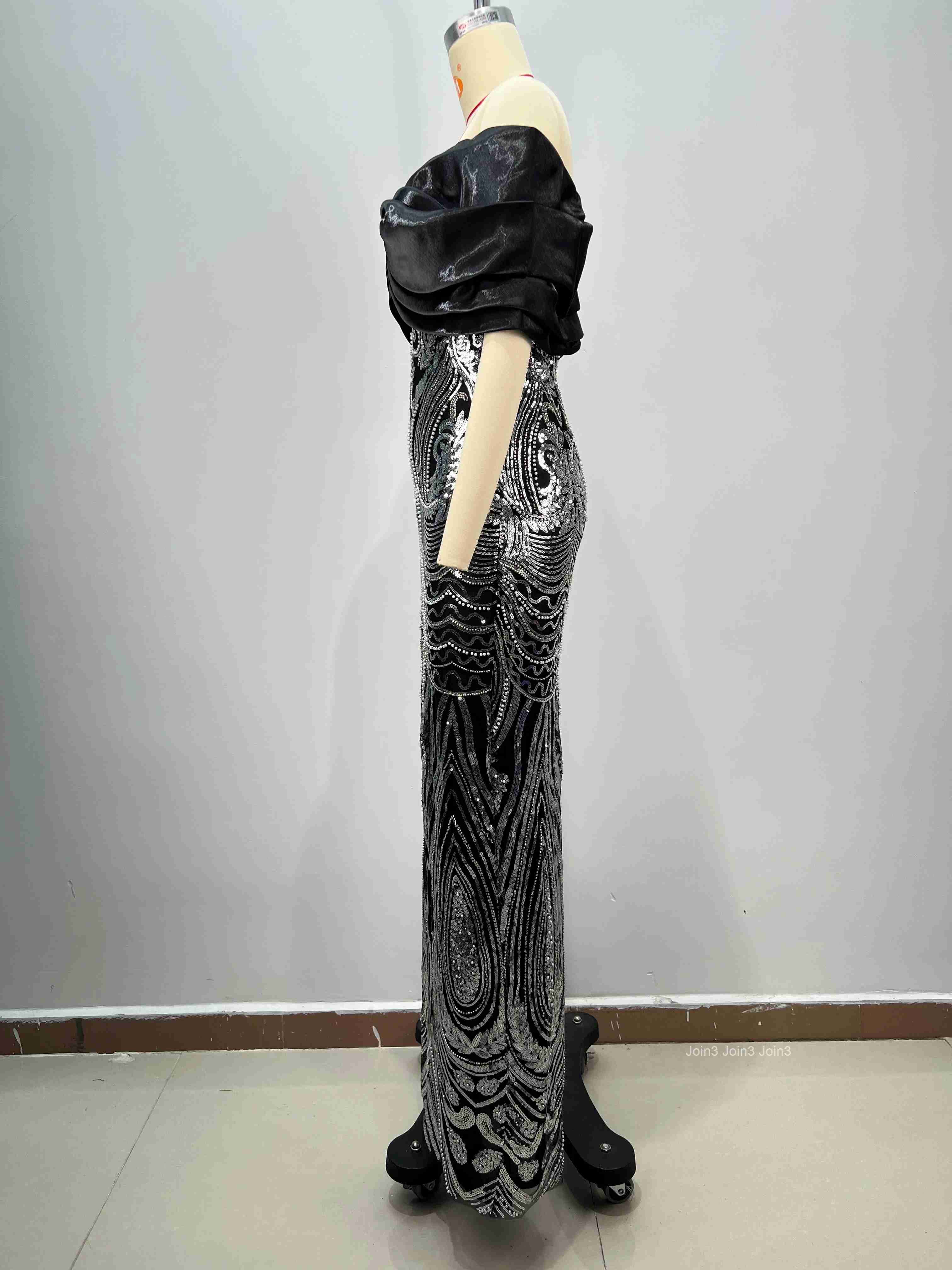 Stylish Black Silver Beaded Evening Gown with Flowing Skirt Fitted Bodice for Red Carpet Gala Formal Events