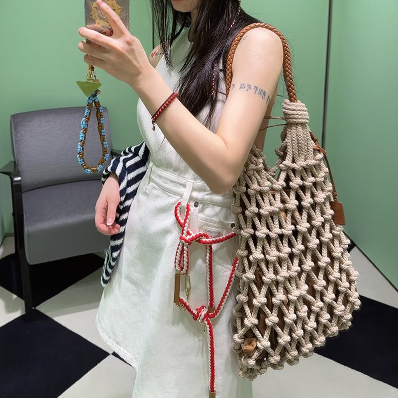 Free shipping designer bag Ins Style 2025 Spring Summer New Casual Handwoven Shoulder Bag Handheld Bag Forest Style Mesh Beach Bag Women Bag